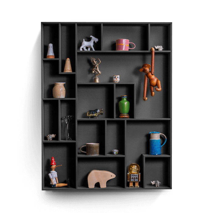 decorative wall shelf NicNac Tall with playful compartments displaying various keepsakes