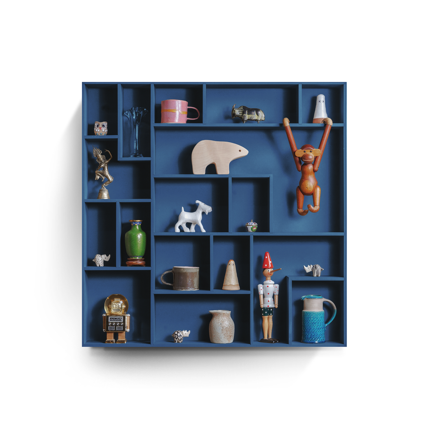 NicNac Timeless Box Shelf in blue, front view with defined compartments and small collectibles