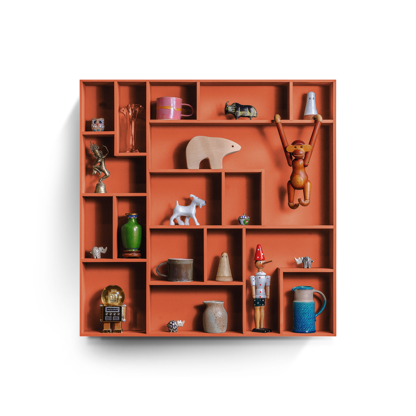 NicNac Timeless Box Shelf in orange, front view with defined compartments and small collectibles
