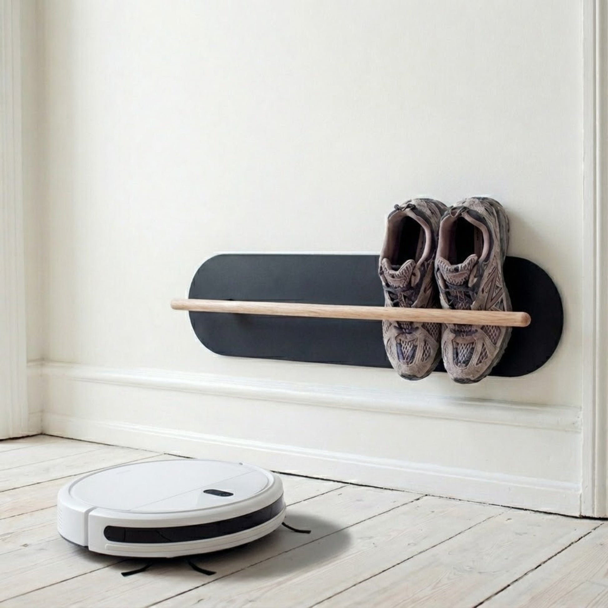 Minimalist space saving shoe rack in hallway, designed for small apartments and modern homes, easy to clean the floors under
