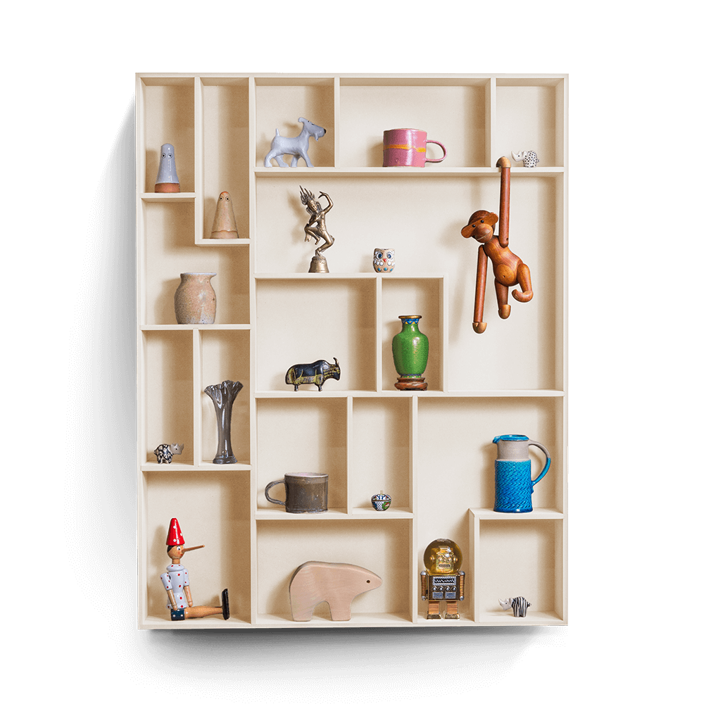 NicNac Tall decorative wall shelf in beige with multiple compartments displaying various small decorative items.