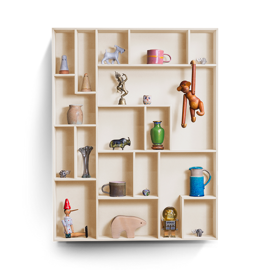 NicNac Tall decorative wall shelf in beige with multiple compartments displaying various small decorative items.