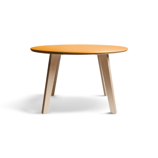 Birch dining table with minimalist Scandinavian design and vibrant Valchromat top.