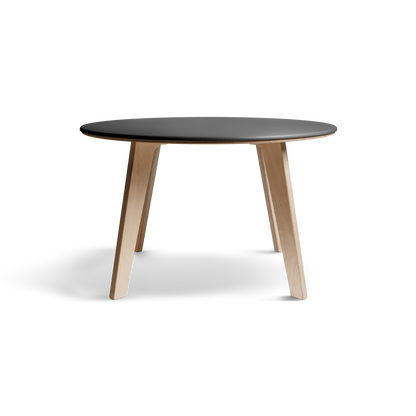 Birch dining table with black Valchromat® top and natural birch legs.