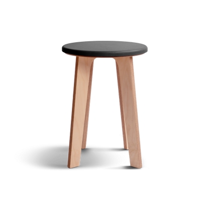 Birch stool with black top and natural wooden legs, combines elegance and Nordic craftsmanship.