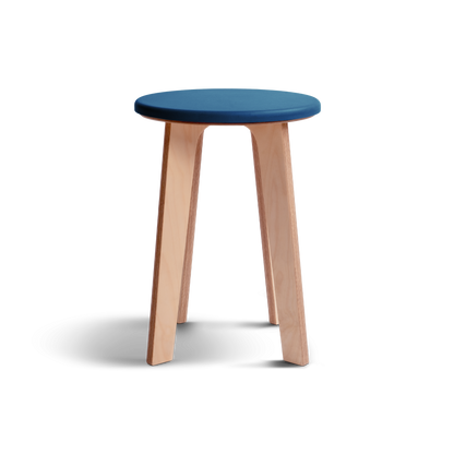 Elegant birch stool with vibrant blue Valchromat® top, minimalist Nordic design.