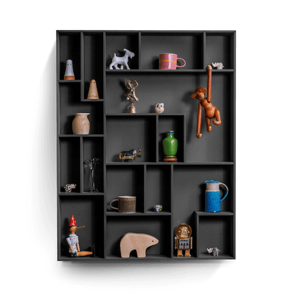 decorative wall shelf NicNac Tall with playful compartments displaying various keepsakes