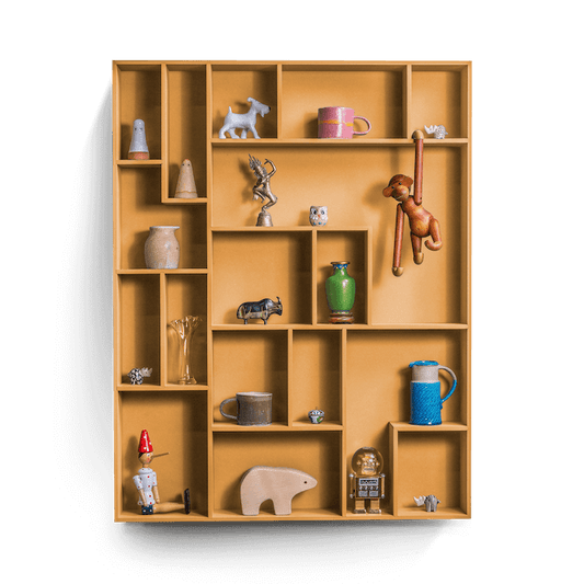 decorative wall shelf with playful compartments for displaying treasures