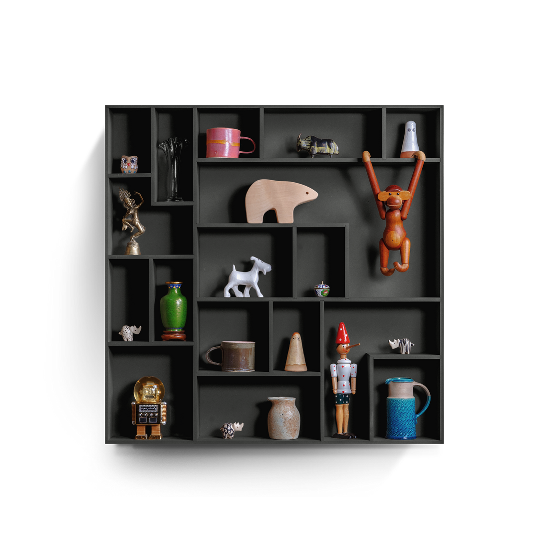 NicNac Trinket Shelf in black, front view with defined compartments and small collectibles