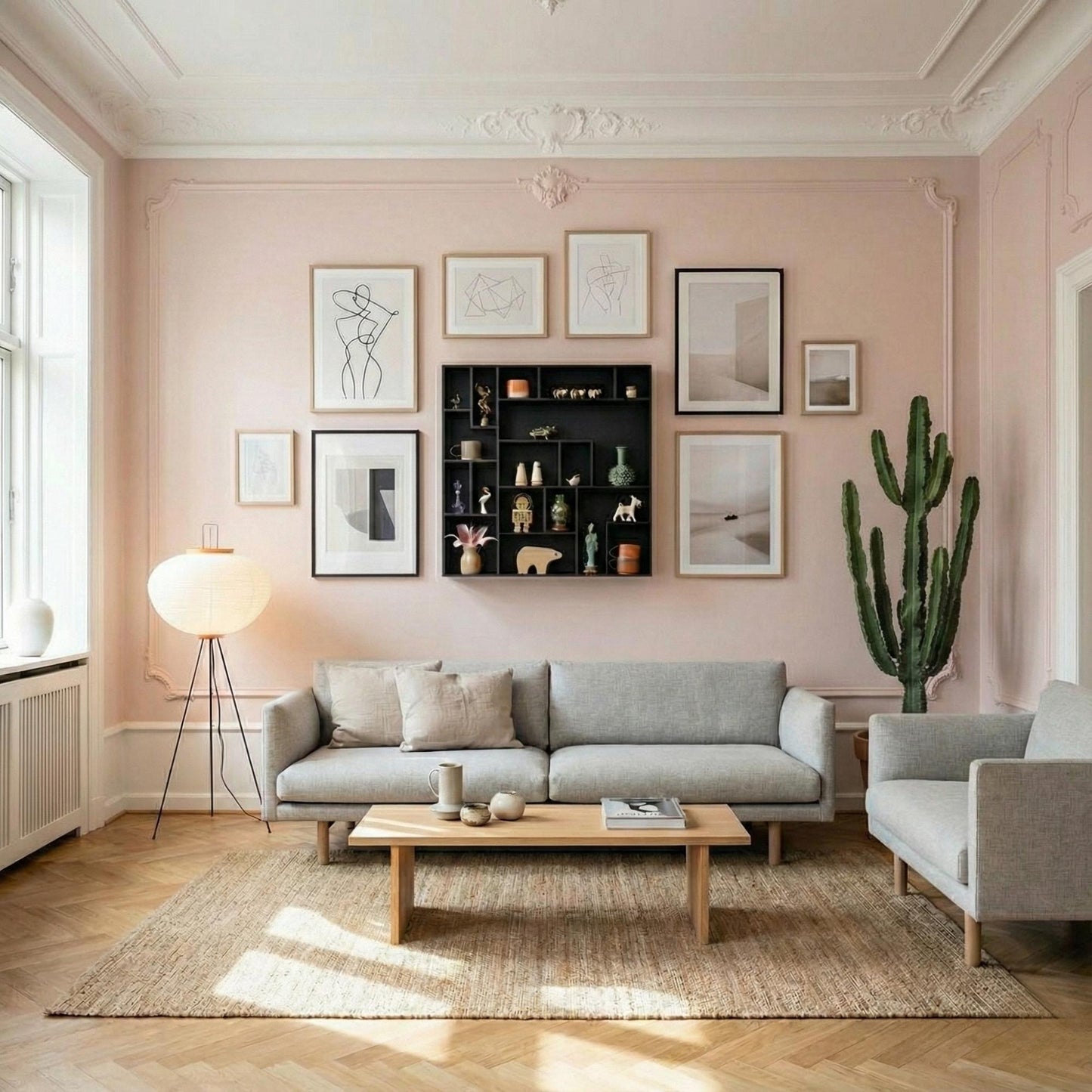 Modern Copenhagen living room with a two beige sofas, coffee table, decorative wall art and a black NicNac Box-Shelf