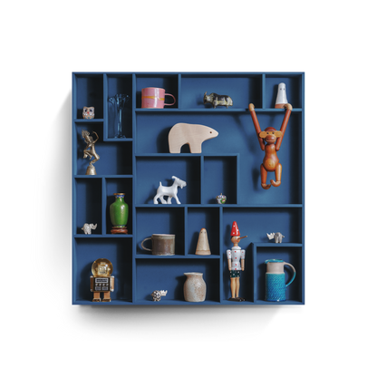 NicNac Timeless Box Shelf in blue, front view with defined compartments and small collectibles