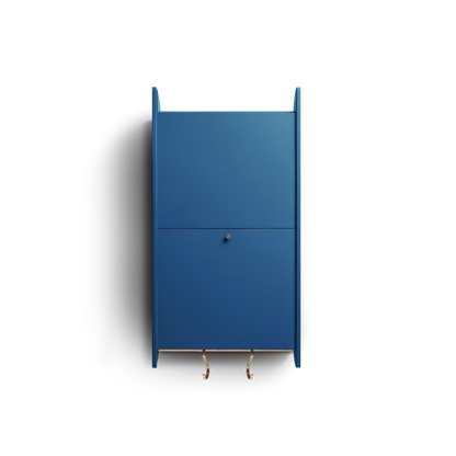 Space-saving cabinet with upward-gliding doors in blue Valchromat.