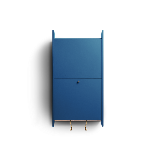 Space-saving cabinet with upward-gliding doors in blue Valchromat.