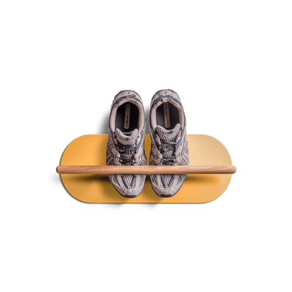 minimalist space saving shoe rack with sneakers on floating wooden shelf