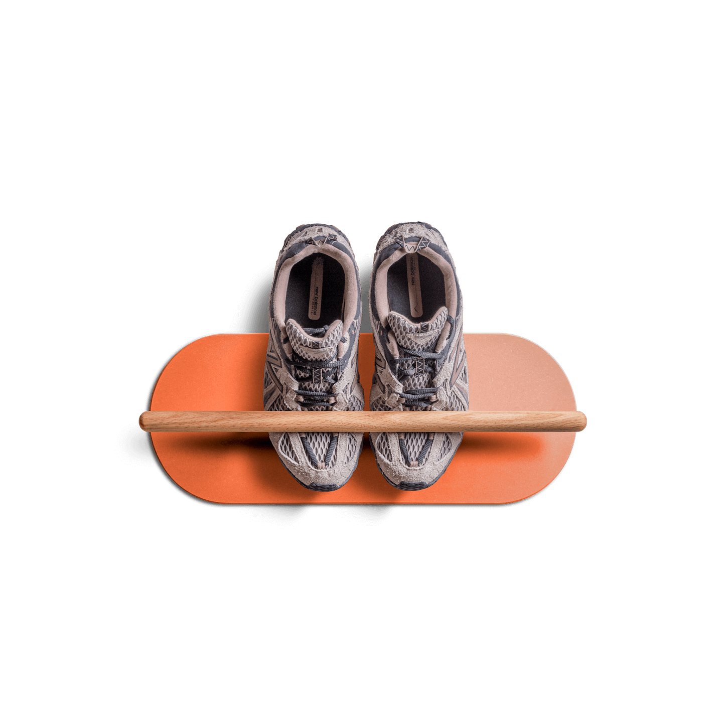 minimalist space saving shoe rack with floating wooden bar holding shoes on orange base