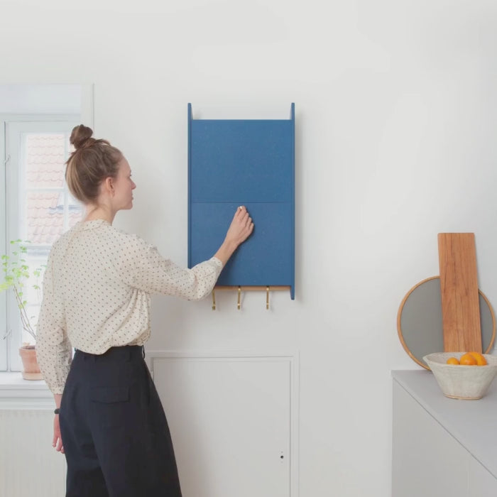 Video of the Balance shallow wall cabinet, just 14 cm deep, with its vertical sliding door