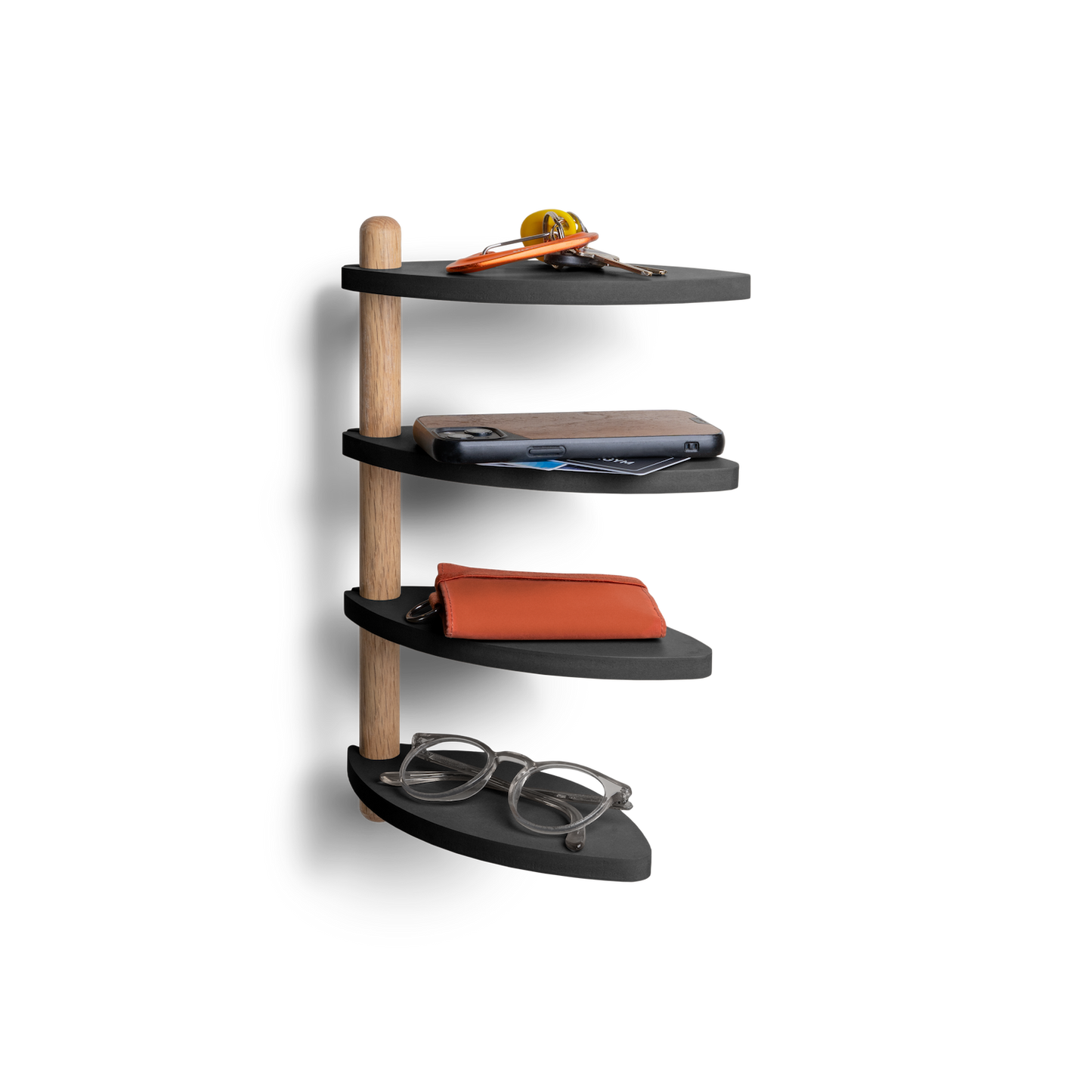 Adjustable wall shelf made from recycled materials, featuring keys and accessories on display.