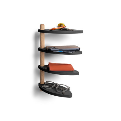 Adjustable wall shelf made from recycled materials, featuring keys and accessories on display.