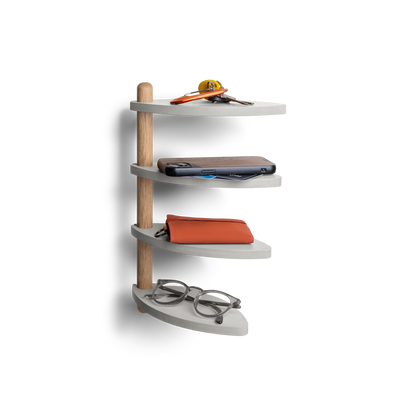 adjustable wall shelf made from sustainable off-cut materials displaying small items
